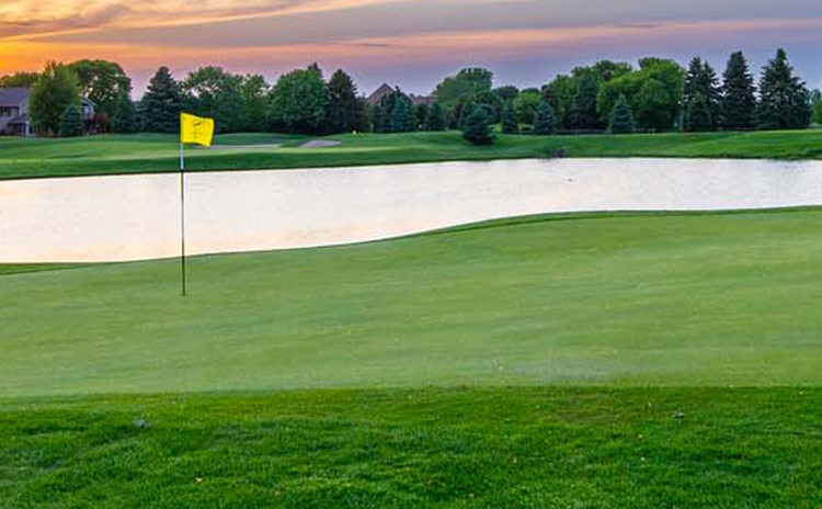 Yellow flag on golf course